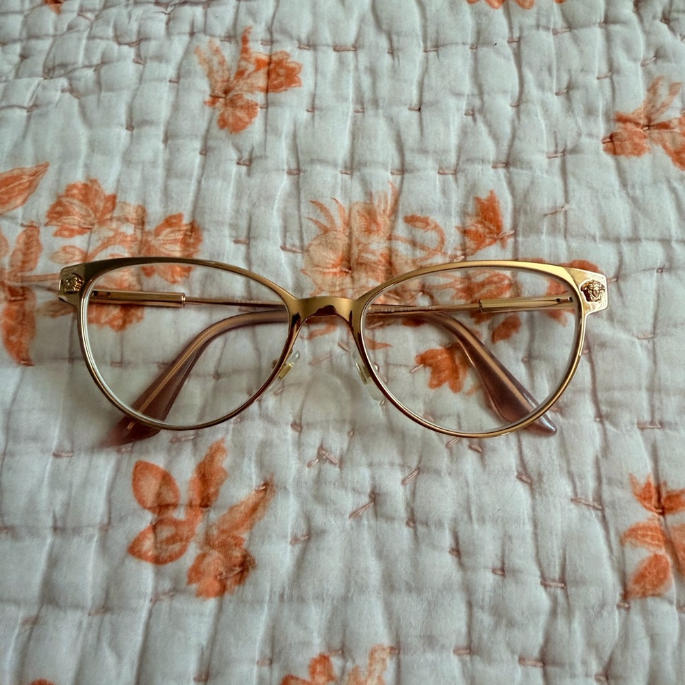 Versace VE1277 eyeglasses in a rose gold metal cat-eye frame